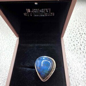 sterling silver ring featuring a pear-shaped labradorite gemstone.